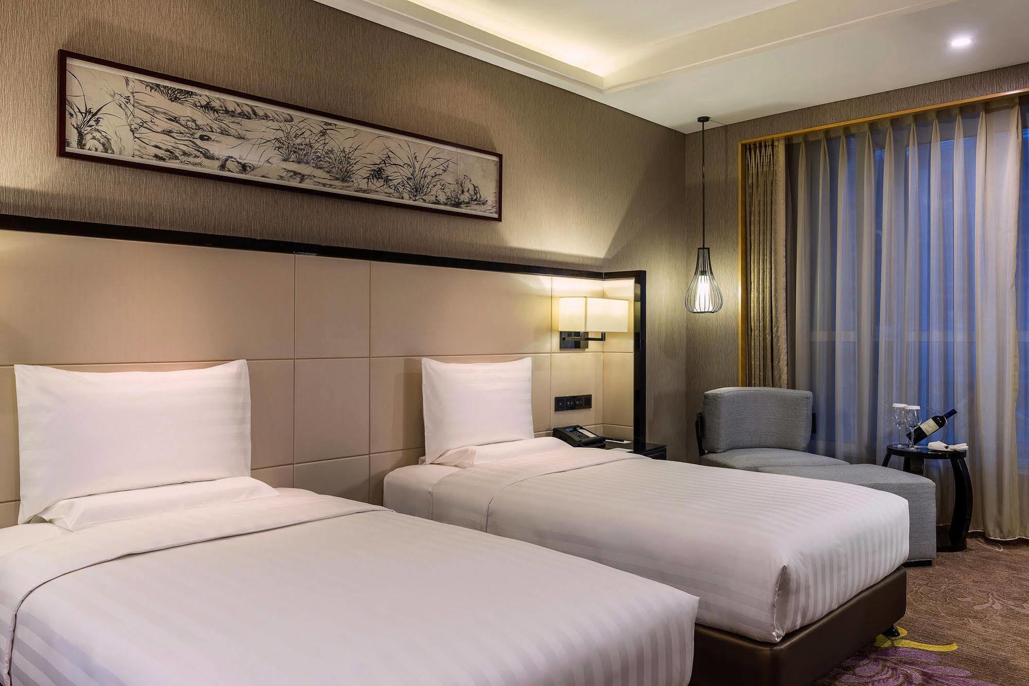 Pullman Qingdao Ziyue Hotel Buitenkant foto